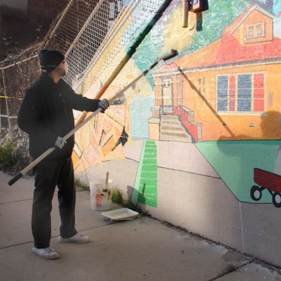 Keith Pollok sealing his mural-Nov 20, 2017