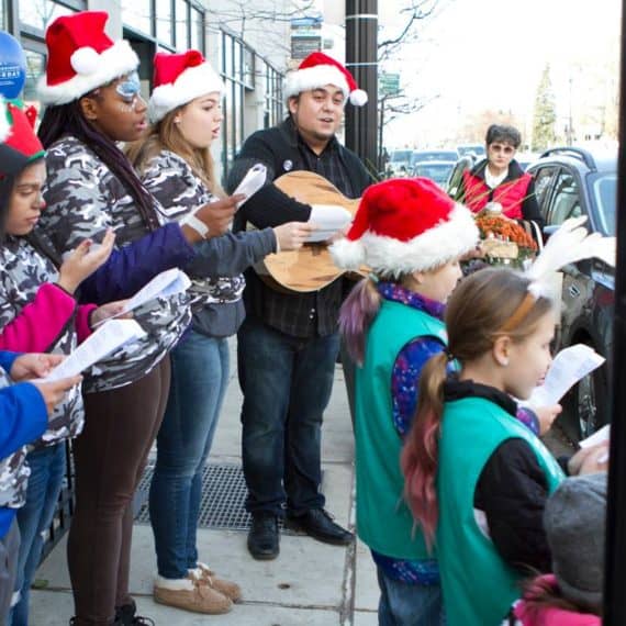 Caroling by Girl Scouts and Dale Tippett Jr at City Newsstand 2016